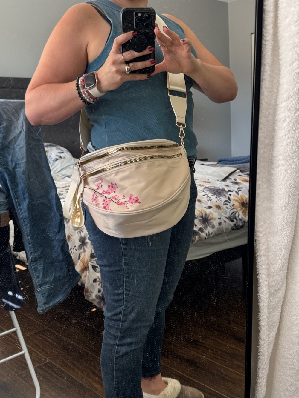 Cream floral crossbody bag; viral “Emmafy” bag
